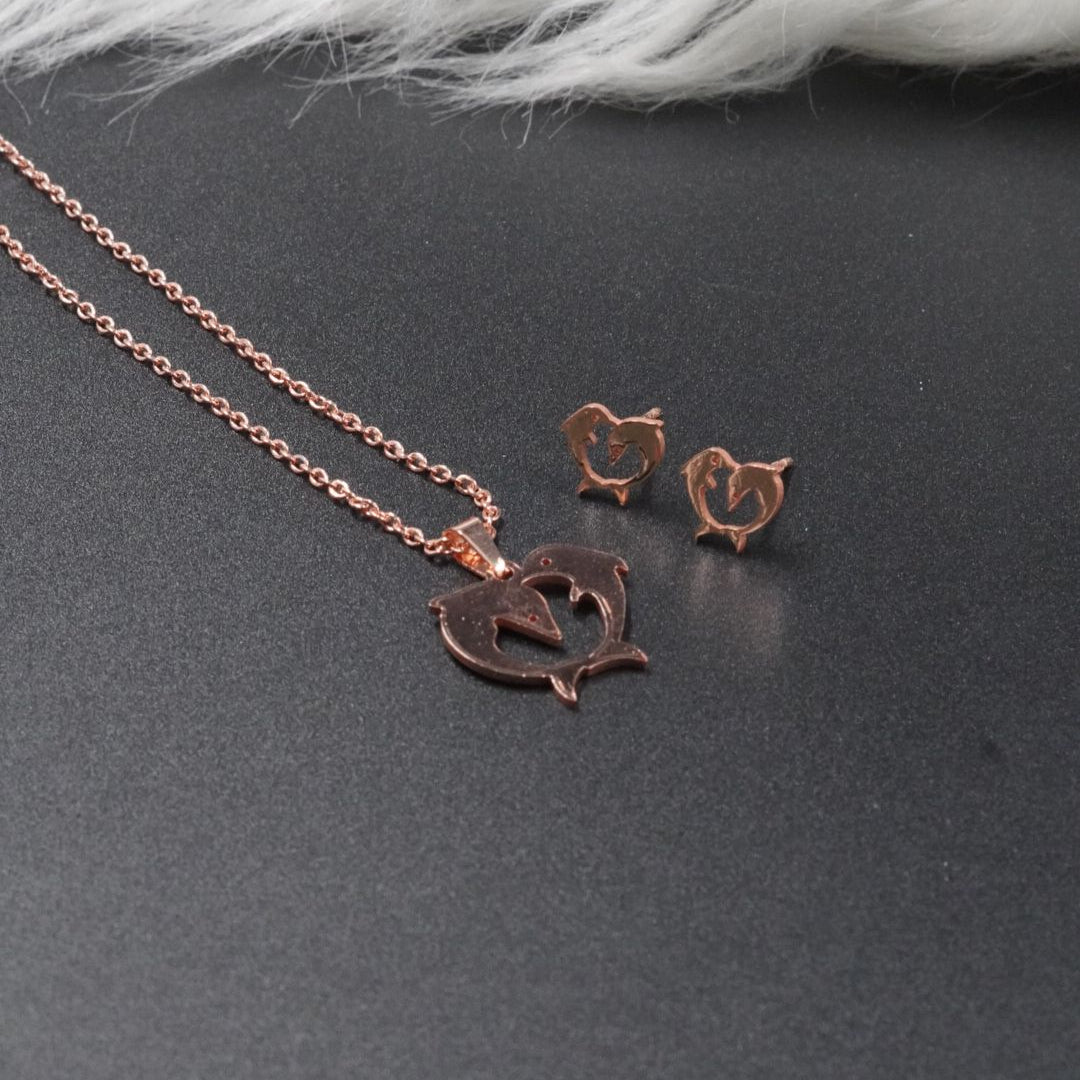 COMBO CADENA+ARETE+DIJE ECO DELFINES ROSADOS