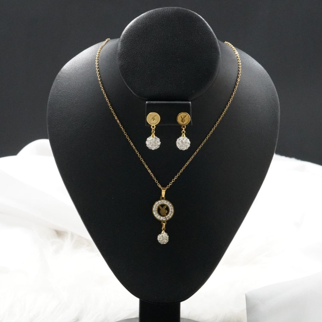 COMBO CADENA+DIJE+ARETE BOLA DE FUEGO CONEJITO DORADO