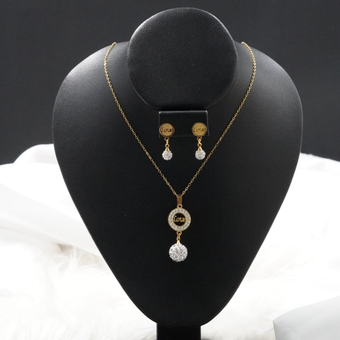 COMBO CADENA+DIJE+ARETE BOLA DE FUEGO LOVA DORADO